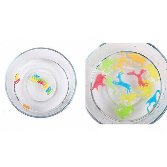Water-growing capsules transforming into sponge dinosaurs and animals for kids’ bath or water play.