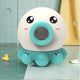 Baby laughing under water-spraying octopus bath toy