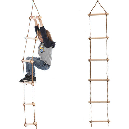 Kid climbing on a wooden rope ladder suspended in the air