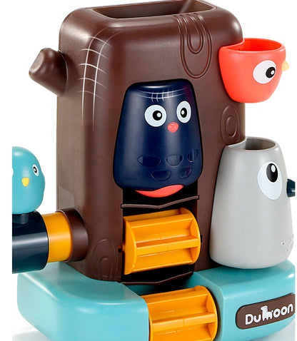 Colorful animal-themed waterwheel bath toy with multiple water streams