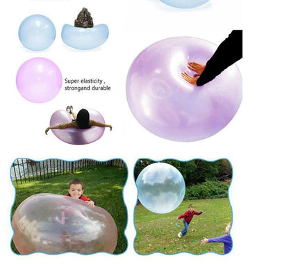 Children playing with a giant transparent bubble ball