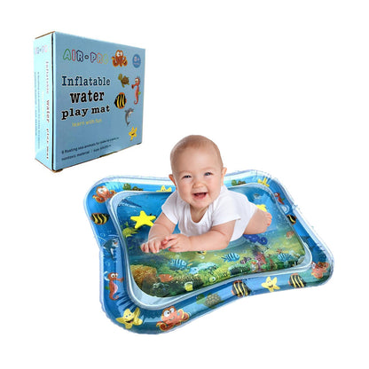 Baby playing on inflatable water mat with ocean animals